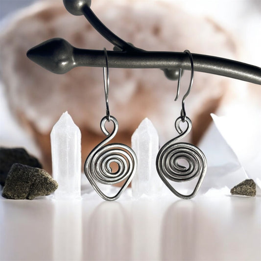 Boucles d’oreilles en acier - Naissance de l’Unalome –